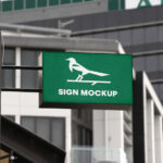 Perspective View of a Wall Mounted Shop Sign Mockup