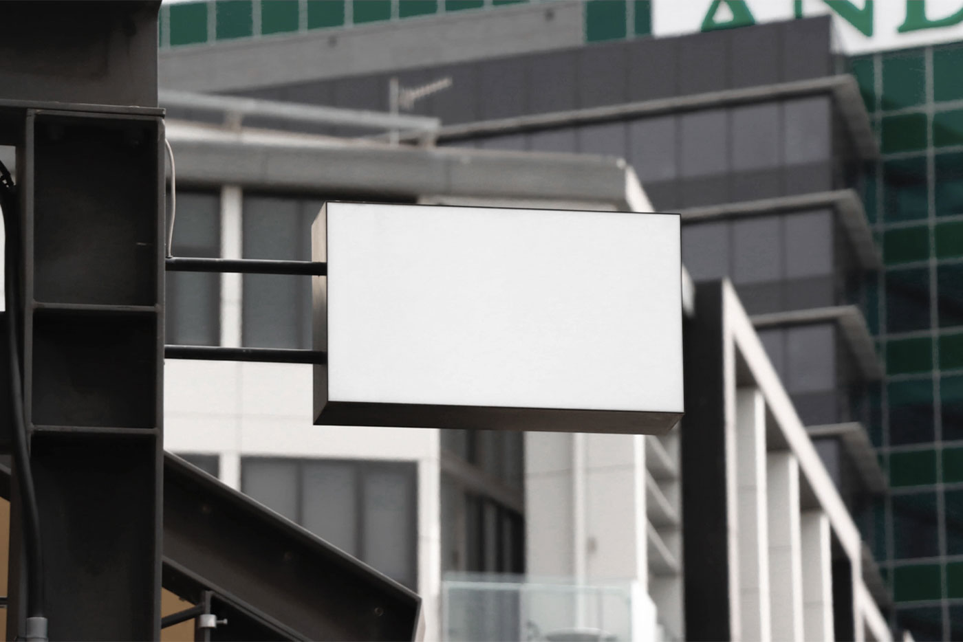 Perspective View of a Wall Mounted Shop Sign Mockup FREE PSD