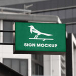 Perspective View of a Wall Mounted Shop Sign Mockup