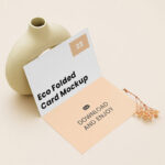 Perspective View of Bi-Fold Brochure Mockup with Vase
