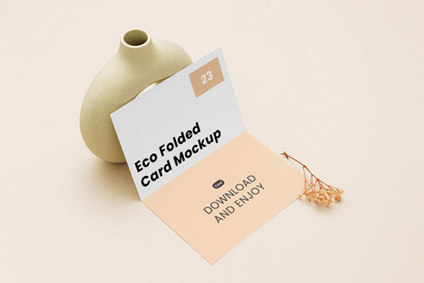 Perspective View of Bi-Fold Brochure Mockup with Vase