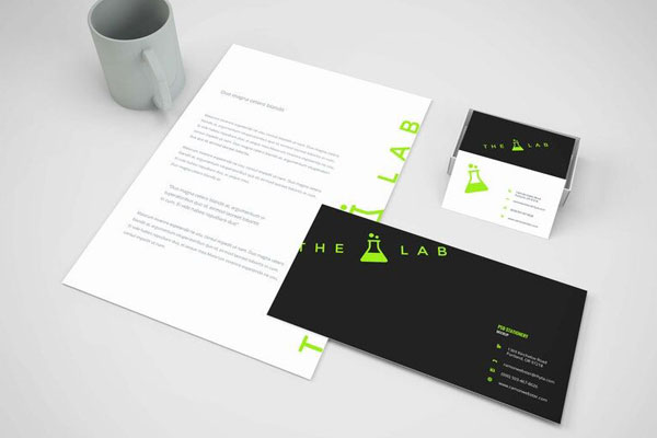 Perspective View of Branding Stationery Mockup Next to a Mug