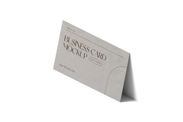 Perspective View of Business Card Mockup Against Wall