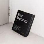 Perspective View of Cardboard Box Mockup Leaning against Wall
