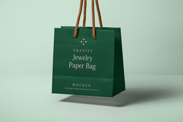 Perspective View of Floating Paper Bag with Cord Handles Mockup