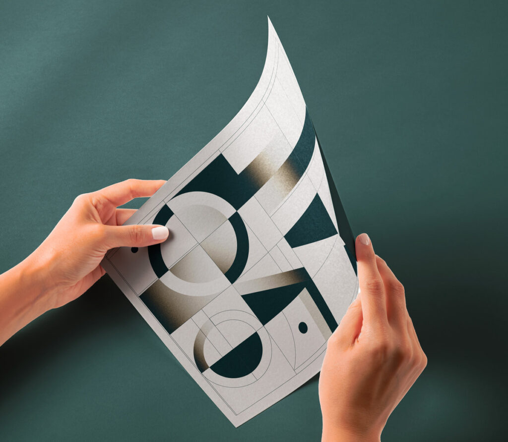 Perspective View of Glossy Paper Mockup in Hands