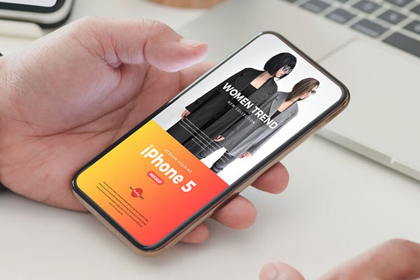 Perspective View of Hand Holding iPhone Five Mockup