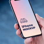 Perspective View of Hand Holding iPhone Mockup