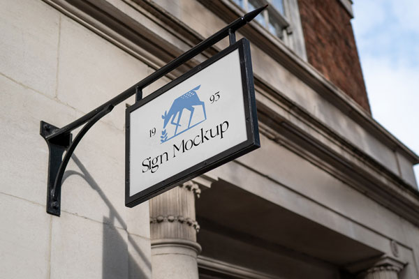 Perspective View of Hanging Sign Mockup in Outdoor Wall