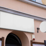 Perspective View of Horizontal Banner Mockup with Circle Sign