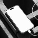 Perspective View of iPhone 15 Pro Mockup on Bricks