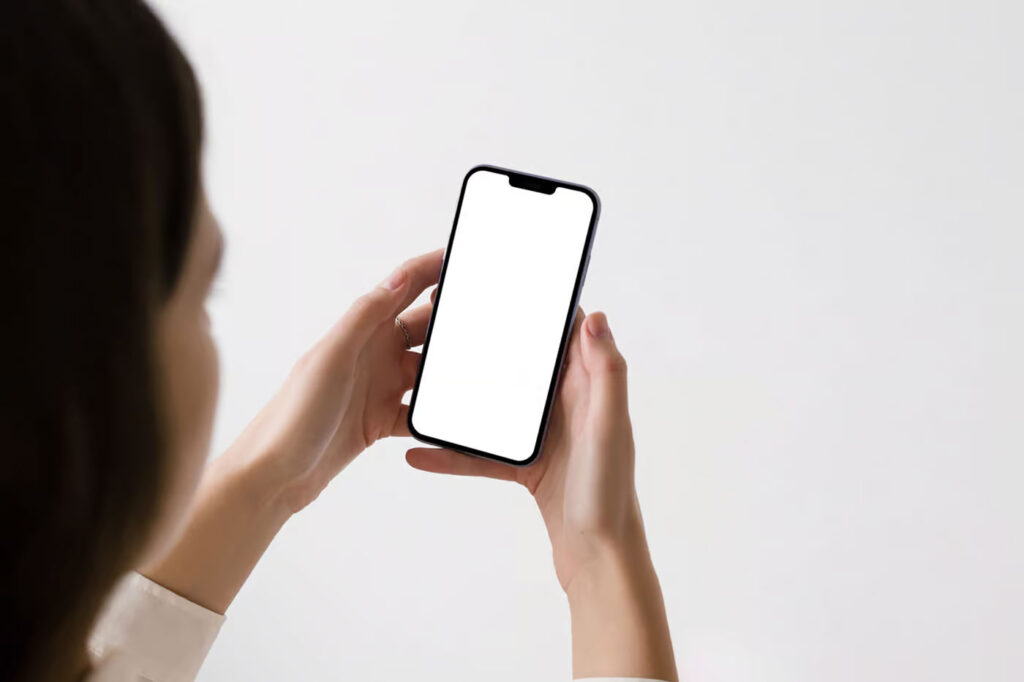 Perspective View of iPhone Pro Mockup in Woman Hands