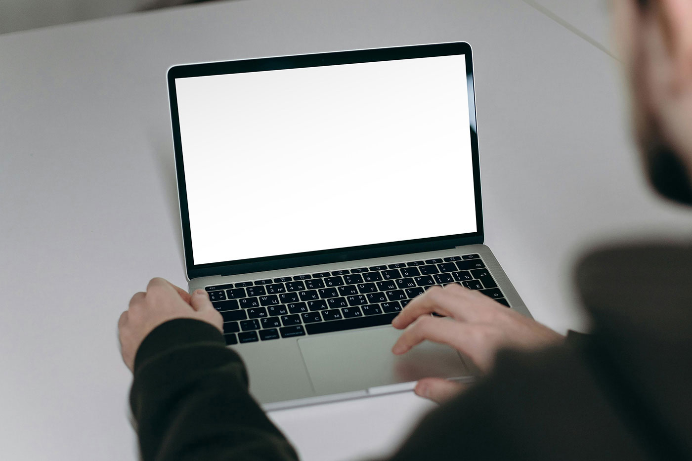 Free Perspective View of MacBook Screen Mockup PSD Template