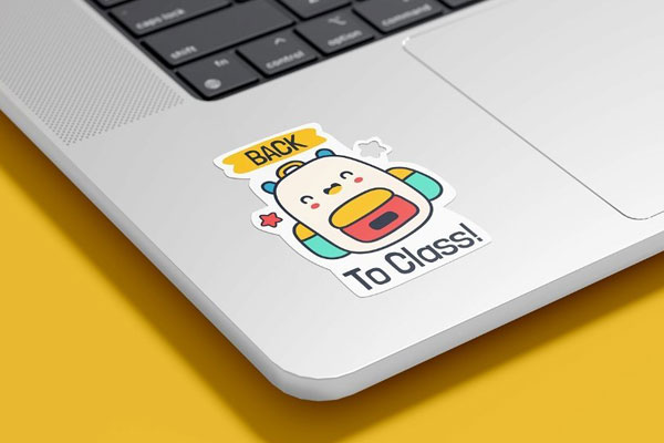 Perspective View of Laptop Sticker Mockup