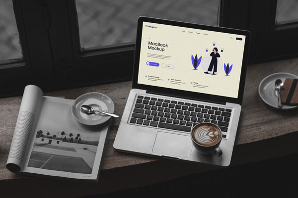 Perspective View of MacBook Mockup in Cafe