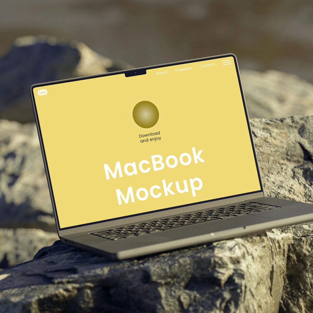 Perspective View of MacBook Mockup on Rock