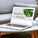 Perspective View of MacBook Mockup on Table