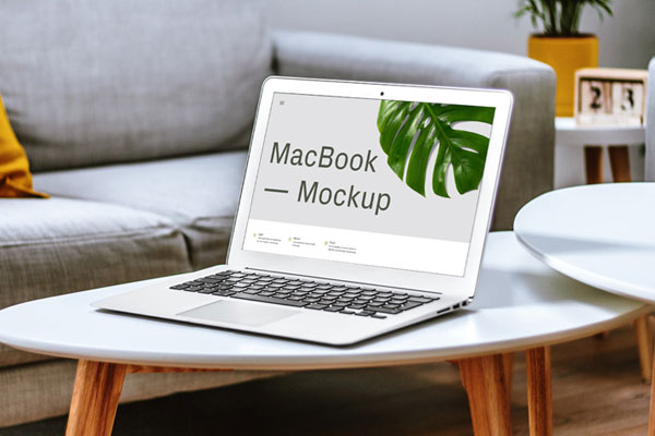 Perspective View of MacBook Mockup on Table
