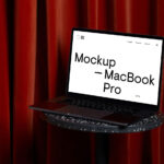 Perspective View of MacBook Pro Mockup on Coffee Table