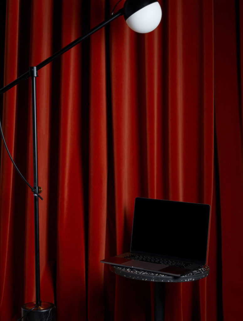 Perspective View of MacBook Pro Mockup on Coffee Table