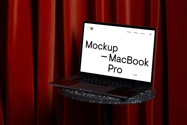 Perspective View of MacBook Pro Mockup on Coffee Table