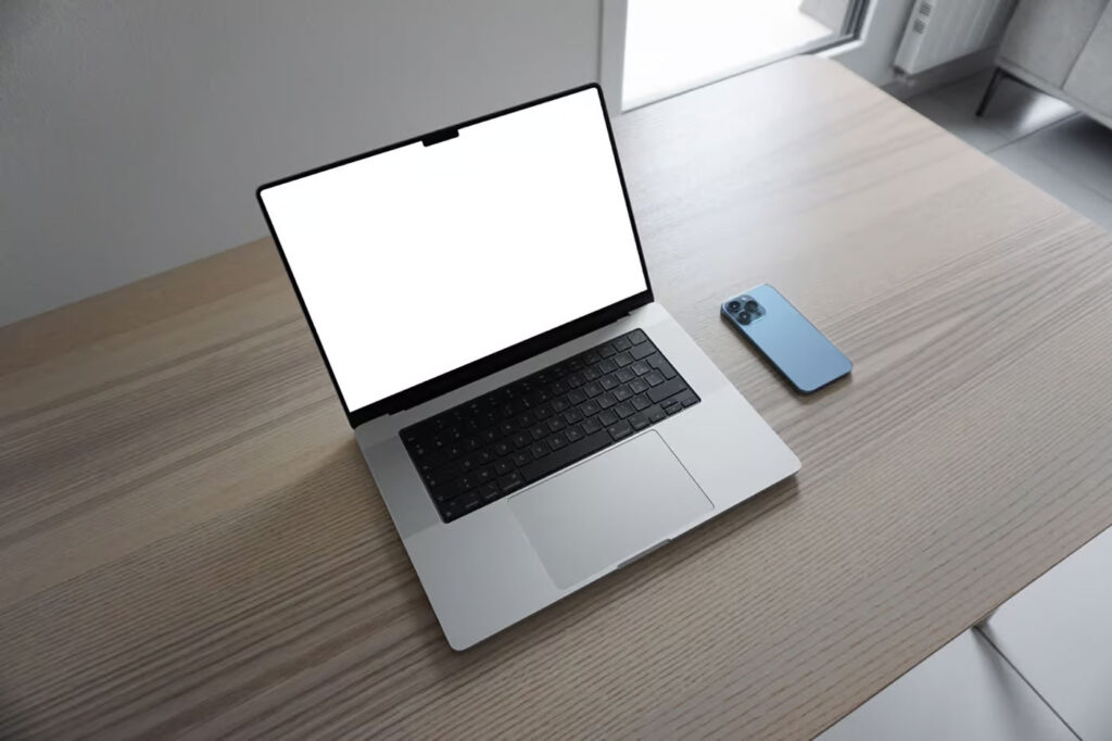 Perspective View of MacBook Pro Mockup on Table