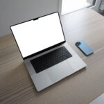 Perspective View of MacBook Pro Mockup on Table