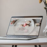 Perspective View of MacBook Pro on Circular Table Mockup