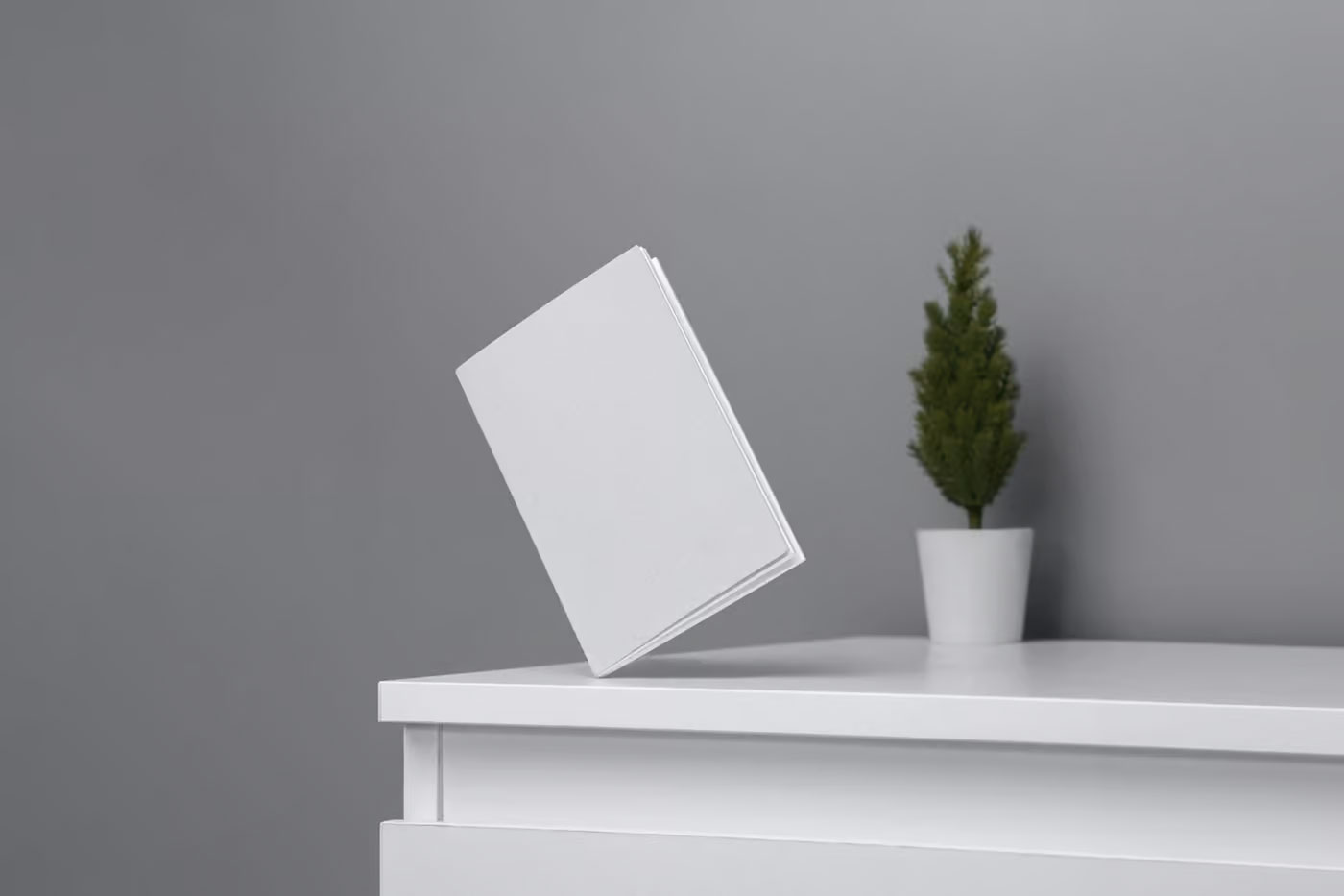 Free Perspective View of Mini A5 Notebook Mockup PSD Template