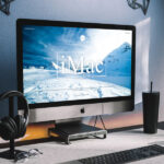 Perspective View of Modern Workstation iMac Mockup in Lifelike Setting