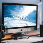 Perspective View of Modern Workstation iMac Mockup in Lifelike Setting