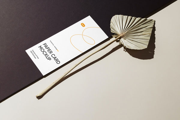 Perspective View of Oblong Paper Card Mockup with Leaf