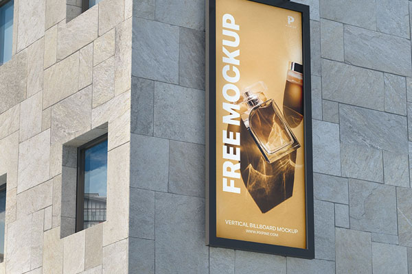 Perspective View of Outdoor Vertical Billboard Mockup on Building