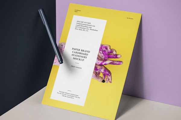 Perspective View of Paper Against Wall and Floating Pen Mockup