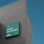 Perspective View of Square Sign Mockup on Brick Building