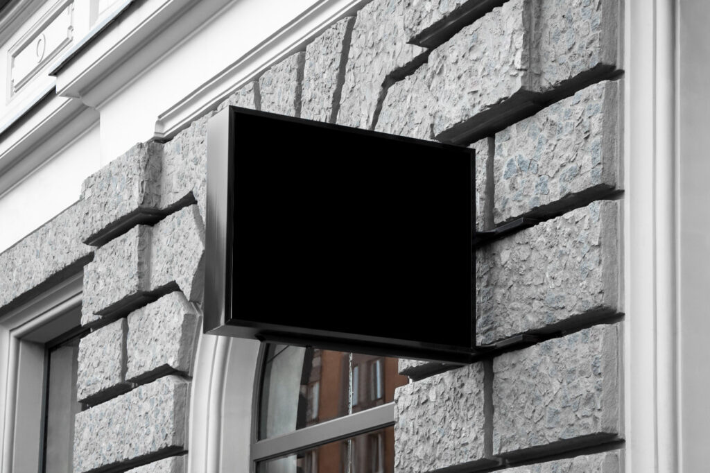 Perspective View of Square Sign Mockup on Building