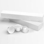 Perspective View of 3 Coffee Capsules and Their Packaging Mockup