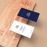 Perspective View of Two Business Cards on Plank Mockup