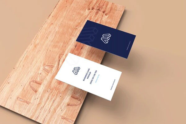 Perspective View of Two Business Cards on Plank Mockup