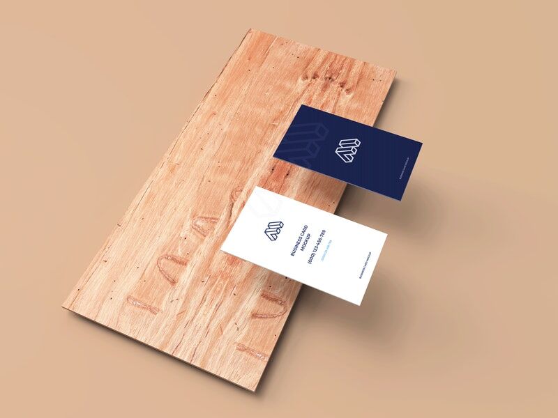 Perspective View of Two Business Cards on Plank Mockup