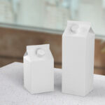Perspective View of Two Milk Packaging in Different Size Mockup