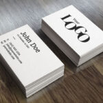 Perspective View of Two Packs of Business Card on Wooden Surface Mockup