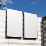 Perspective View of Vertical Billboards Mockup on Building