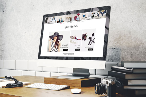 Perspective View of Website on Monitor Screen Mockup in Office Setting