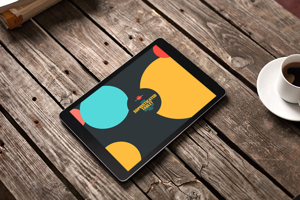 Perspective View Tablet Mockup with a Cup of Coffee