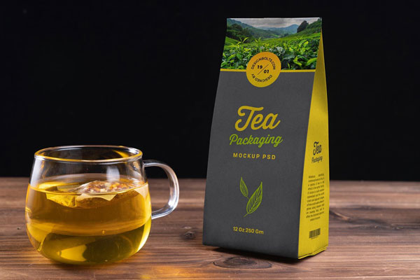 Perspective View Tea Pouch Packaging Mockup with a Glass