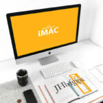 Perspective View Workspace iMac Mockup with Books and Smartphone