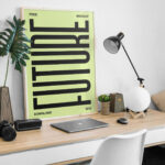 Picture Frame on Desk Mockup with Lamp and Laptop