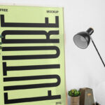 Picture Frame on Desk Mockup with Lamp and Laptop