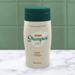 Plastic Shampoo Bottle in Bathroom Mockup